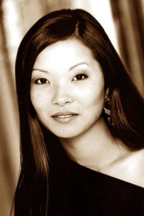 Marie-Yong Godbout-Turgeon as Caroline