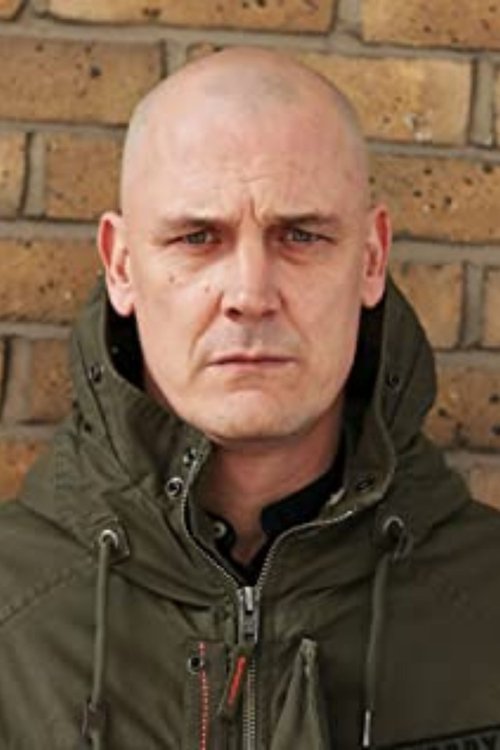 Darren Tassell as Neil