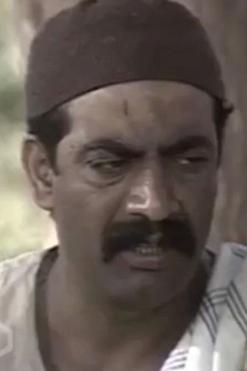 Mohamed Abdel Razek as The Janitor