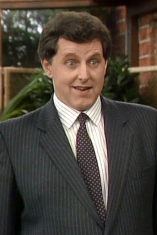 Andrew Tourell as Geoffrey Ballard