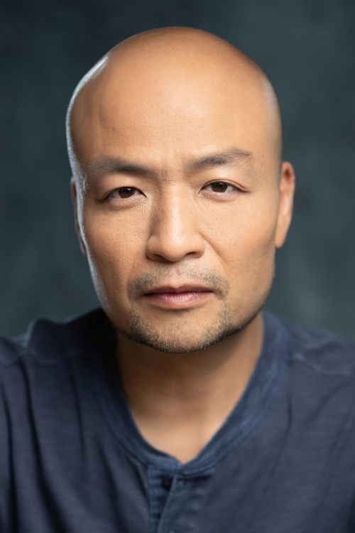 Houston Wong as Georgiou's Father