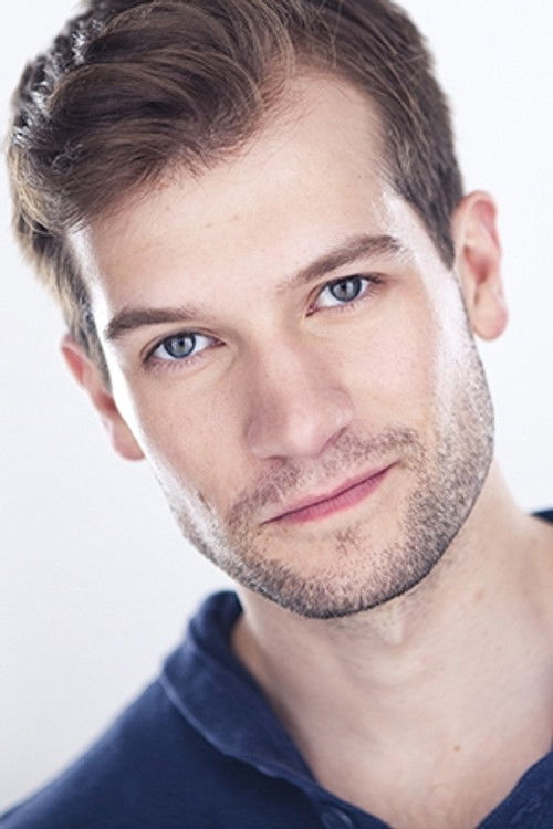Ryan VanDenBoom as Roger Cohen / Ensemble