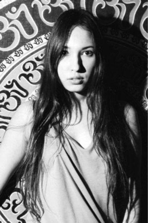 Laura Muñoz as Woman