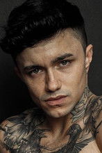 Jake Bass as (archive footage)