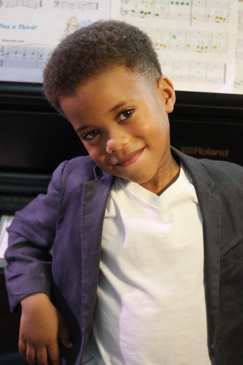 Tiberius Byrd as Young Ahmari Rose // Sidney