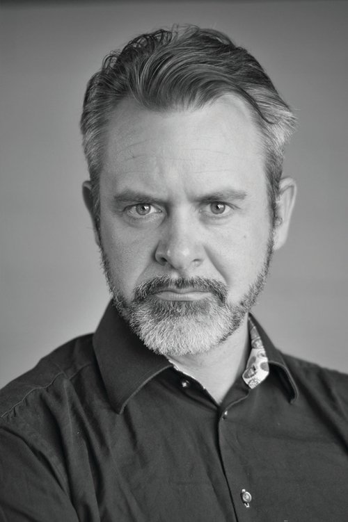 William Flaherty as Le Policier