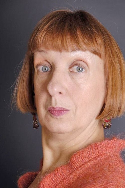 Sylvie Huguel as Emilia