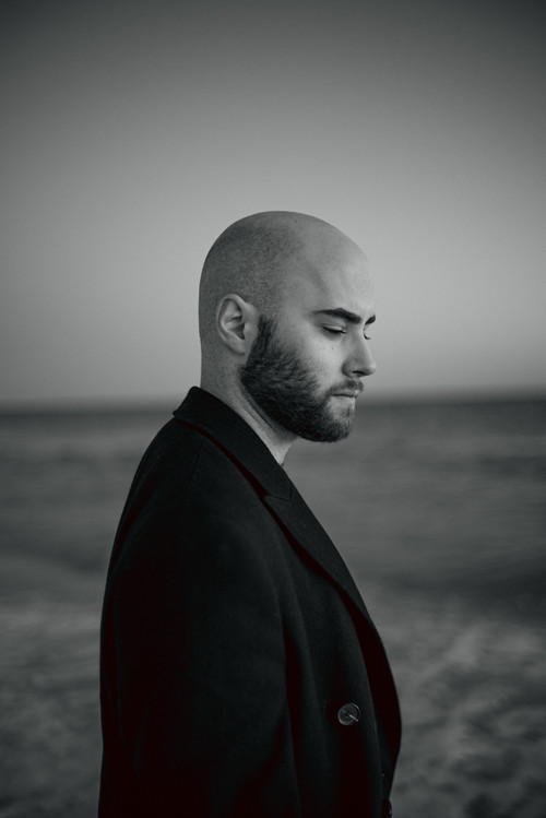 Michael Moroni as The Radio Host