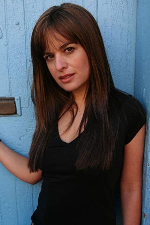 Renata Batista as Dead Woman in Alley