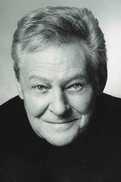 Trevor Bannister as Groomkirby's Co-Worker