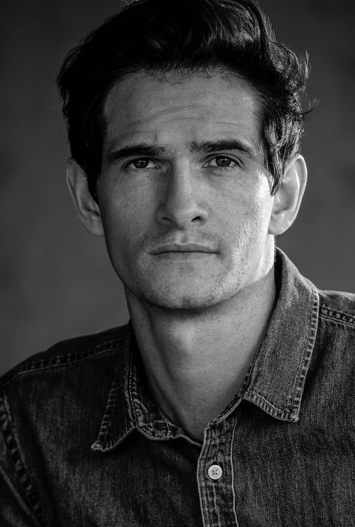 Barron Boedecker as Man In White #1