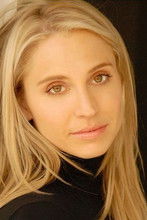 Zorianna Kit as News Reporter