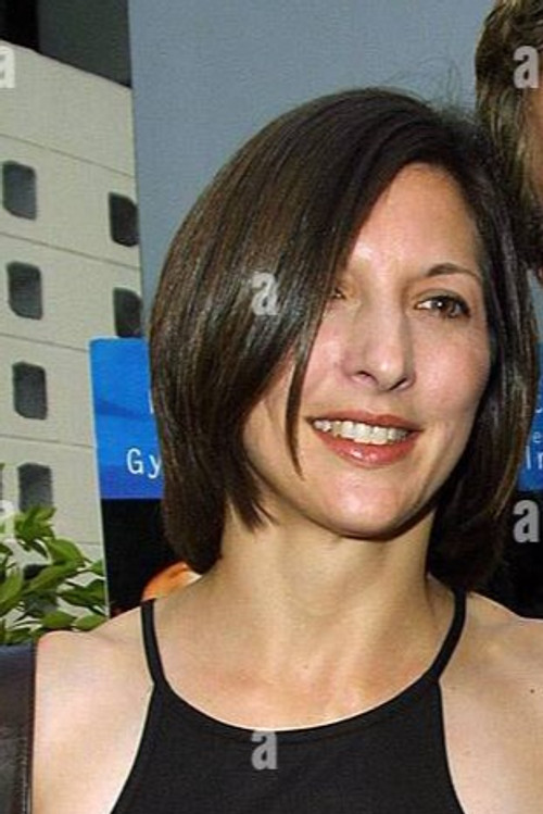 Christine Mourad as Cindy, Elizabeth's Agent