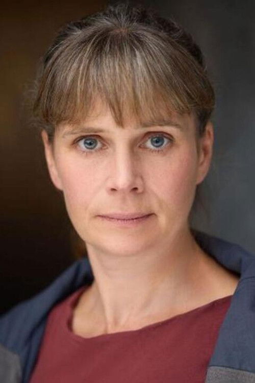 Kirsty Cox as Radio Newscaster (voice)