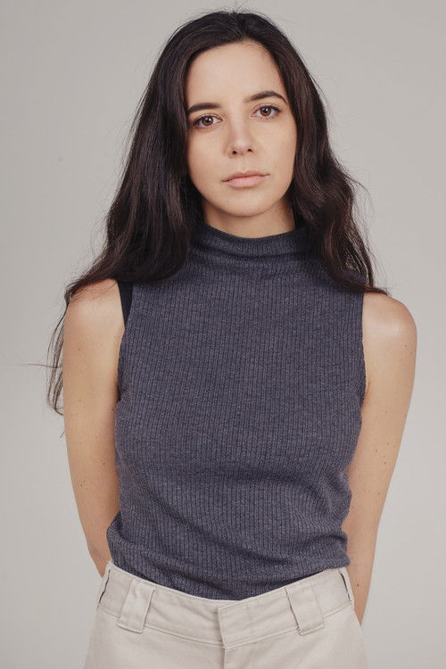 María Jesús Marcone as Newscaster