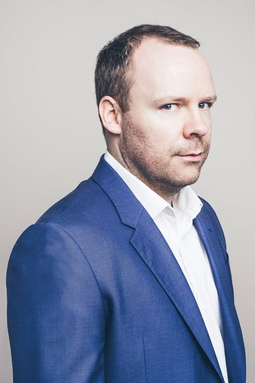 Neil Delamere as 