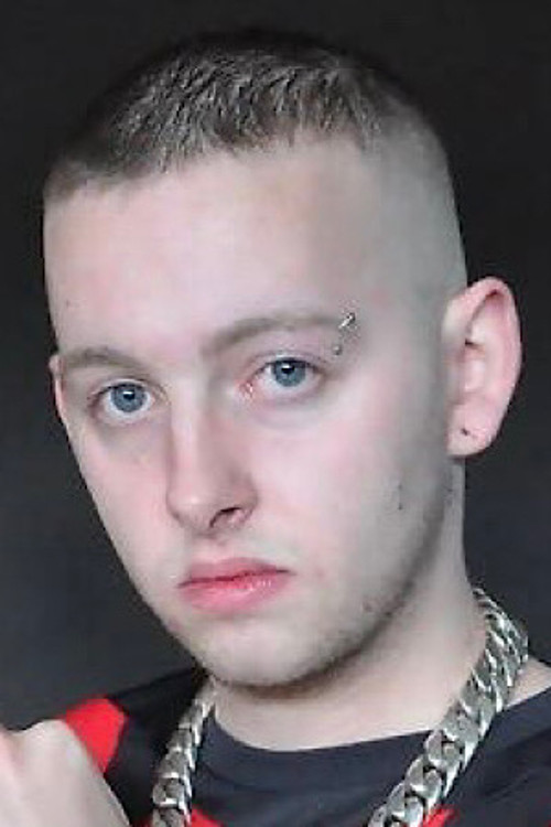 Nick Wilson as (archive footage)