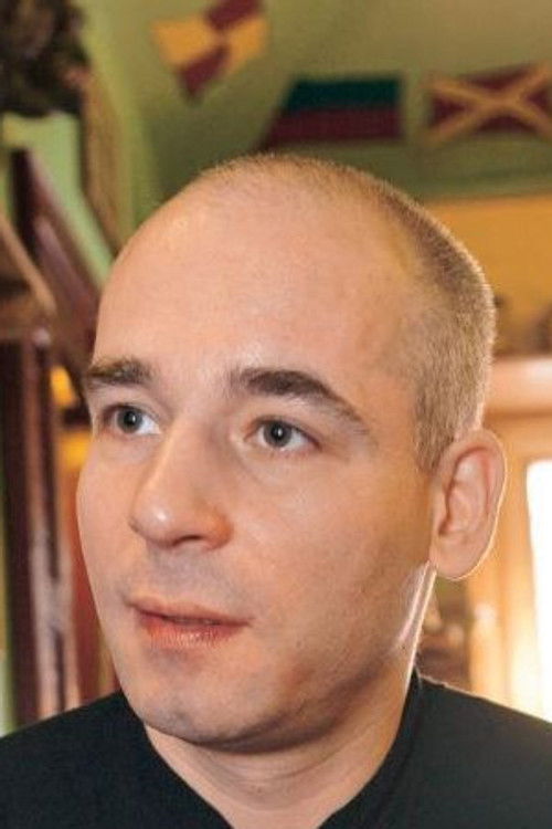 Milan Mikulčík as Mr. K / Father