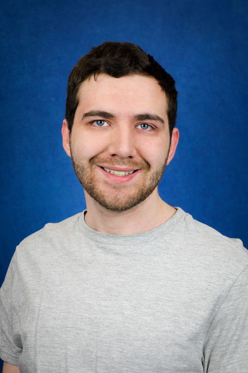 Brandon Matzke as Tom Waits