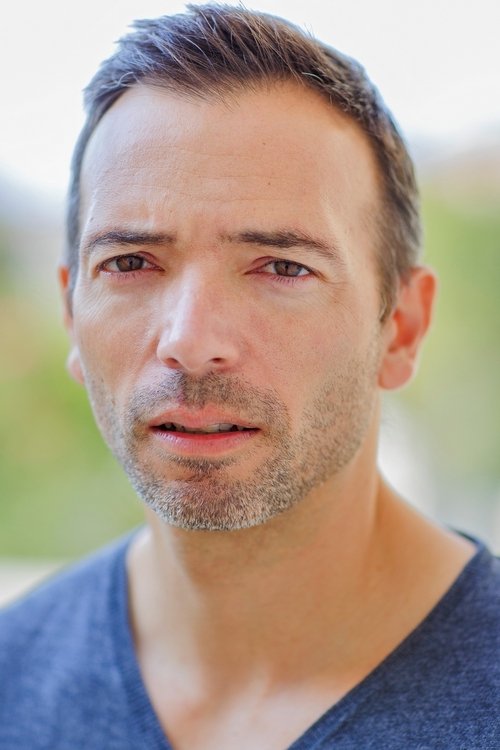 Jérome Care-Aulanier as Police officer at the reception of the police station