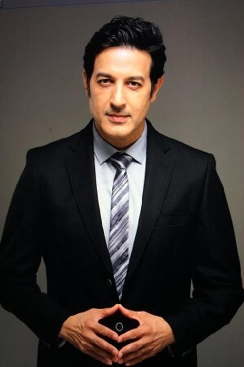 Khalid Siddiqui as Adhiraj Kapoor