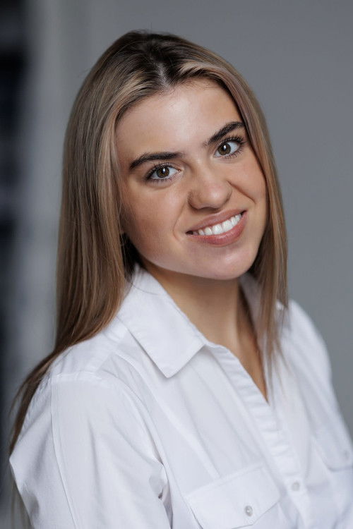 Zara Martin as The Wife