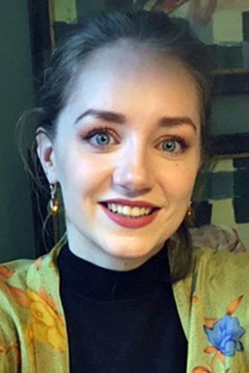 Marie Louise Hansen as Shopkeeper