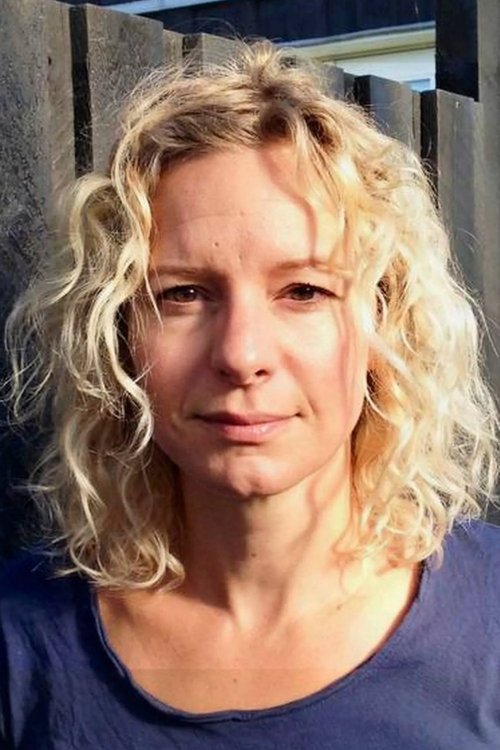 Christine Exner as Reporter / Receptionist (voice)