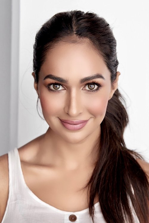 Sharon Johal as Dharma Mallick