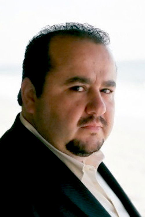 Sassoun Hagopian as DVD Shop Attendant