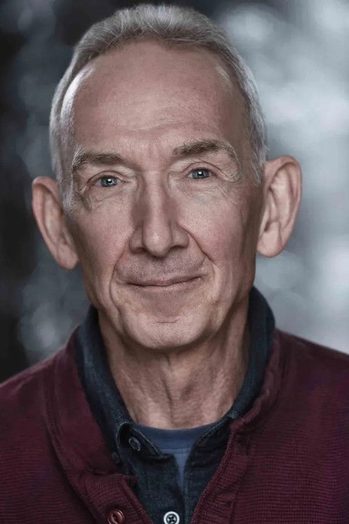 Douglas E. Hughes as Reporter #1