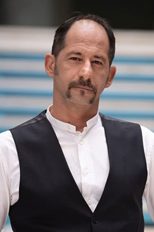 Babis Hawk Konstantinou as Anti-terrorist unit interrogator #1