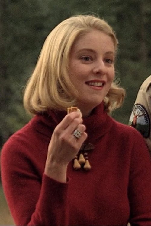 Elizabeth McCarthy as Giggling Secretary