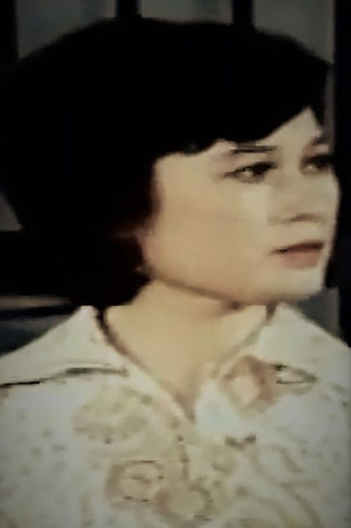 Hải Yến as Ba Cẩn's wife