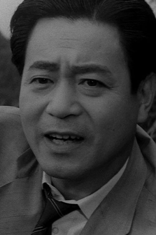 Tomo'o Nagai as Okada (uncredited)