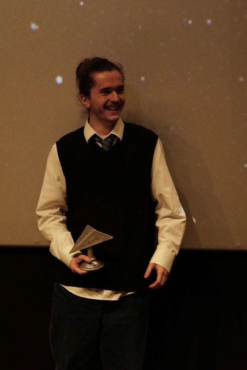 Simon Merlin as Figurant 3