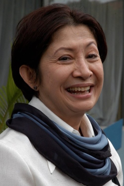 Niniek L. Karim as Mak Syik