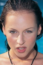 Michelle Wild as (archive footage)