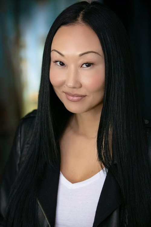 Candace Kita as Reporter Linda Ito