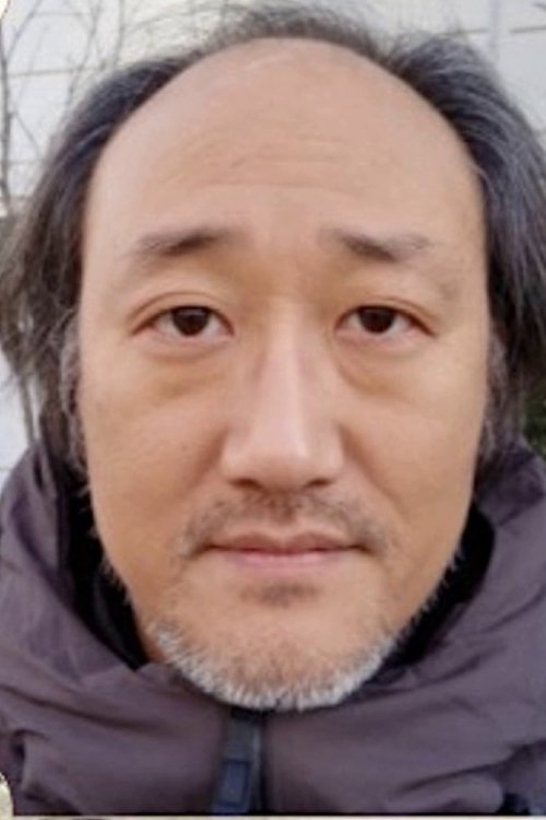 Lee Dong-hee as Head of a Village