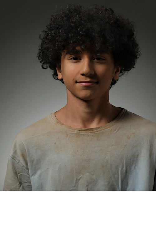 Nikan Jafar Aghaei as Reza