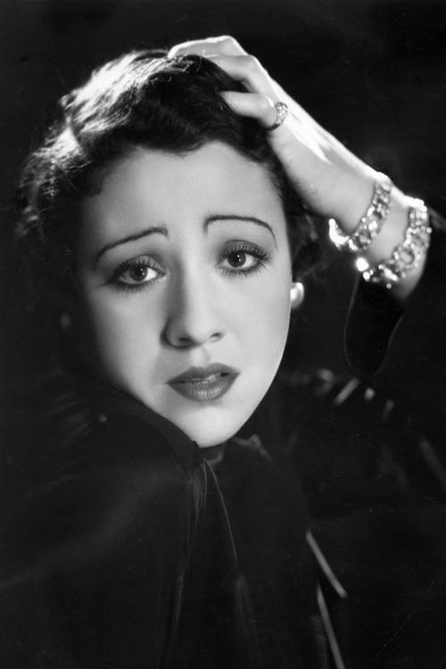 Mireille Perrey as Mother Haudouin