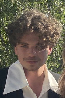 Milan Morris-Gibson as Homo Sapien / Artist