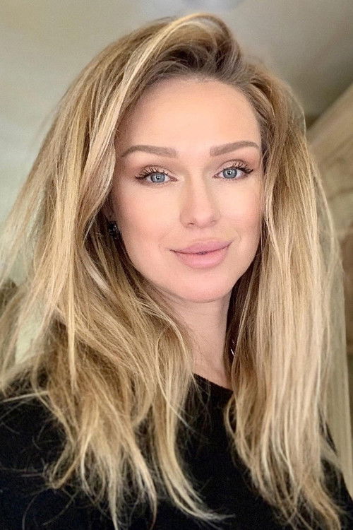 Katarina van Derham as American TV Reporter