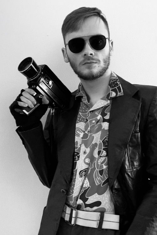 Dean Matschke as Stranger (voice)