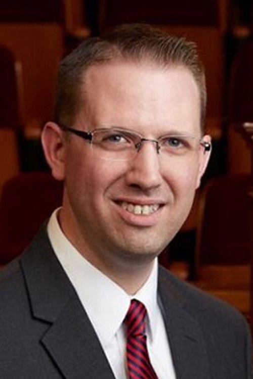 Brian Mathias as Organist