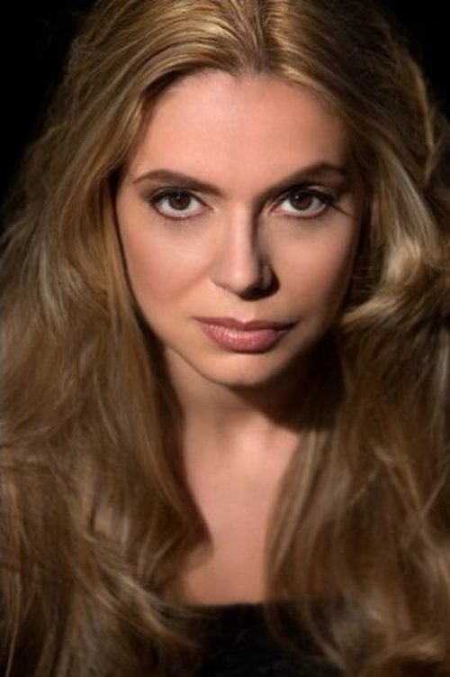 Marie Paquim as Olga Kern