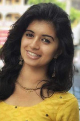 Harija as Divya