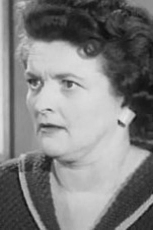 Lisa Lee as Miss Brenner