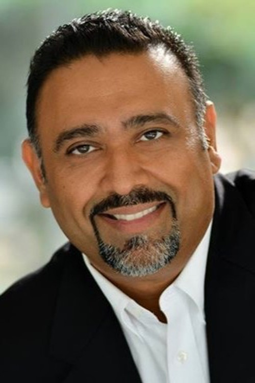 Vee Bhakta as Maitre D'